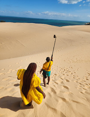 Travelers on Mozambique sand dunes