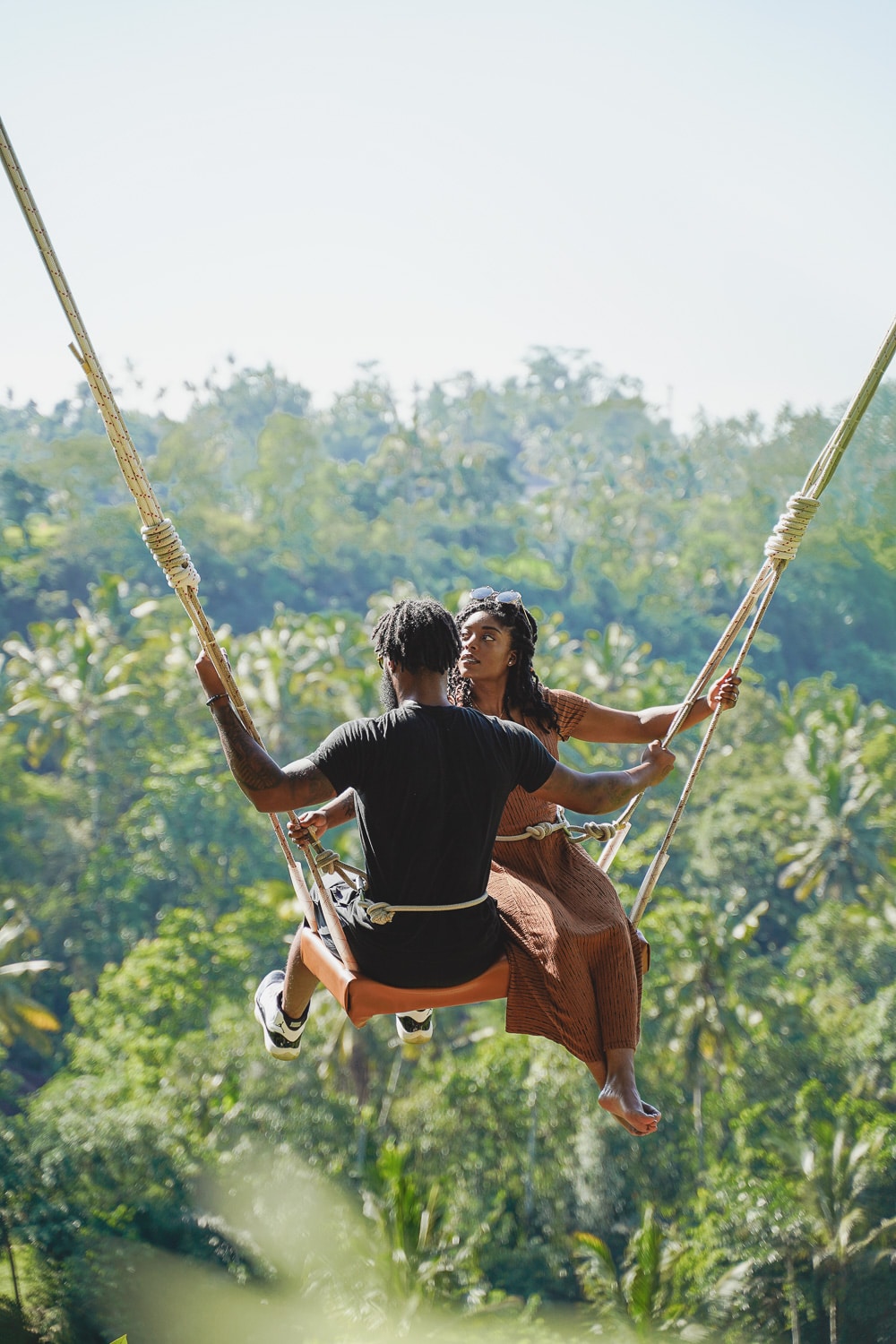 Couple on the Bali jungle swing