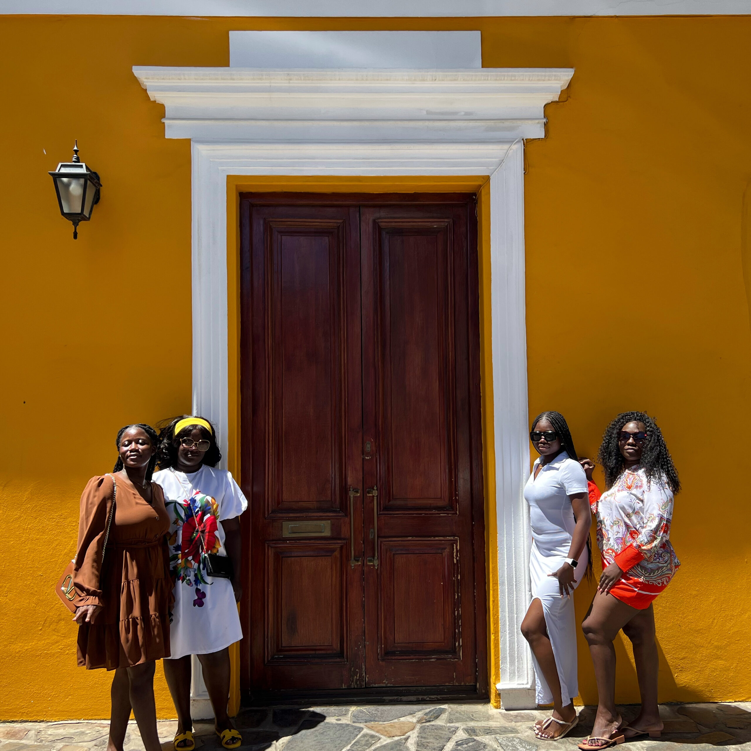 Group at the colourful walls of Cartagena