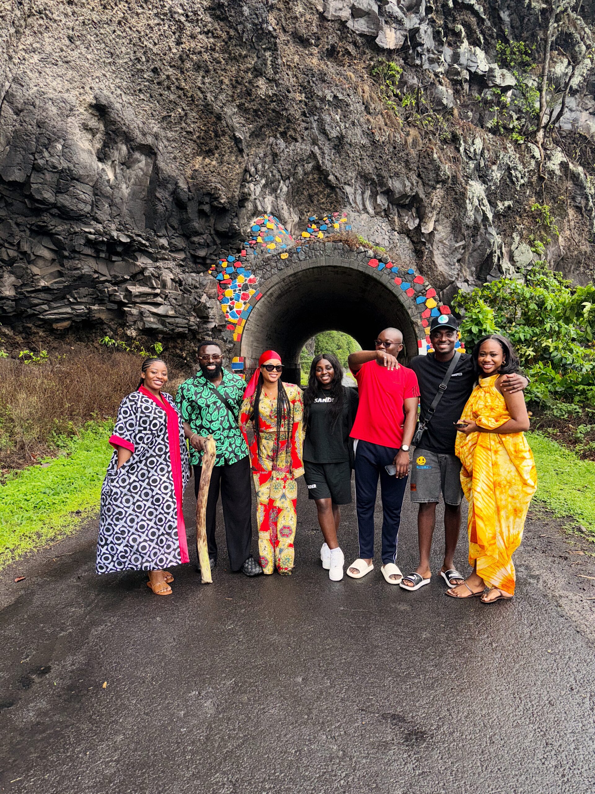 Group celebrating at the Rwanda tunnel